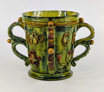 Lot 1109 - A Castle Hedingham green and yellow glazed...