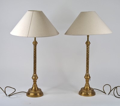 Lot 15 - A pair of Laura Ashley brass ropetwist table...