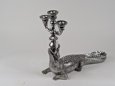 Lot 18 - A silver painted three-branch table candelabra...