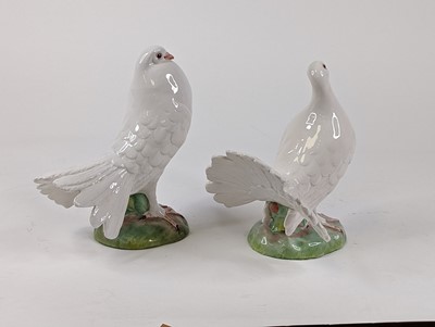 Lot 21 - A pair of Italian pottery figures of fan tail...