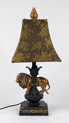 Lot 22 - *A painted composite table lamp having a gilt...