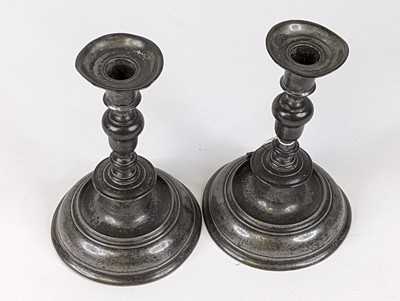 Lot 32 - A pair of pewter table candlesticks, height 24cm