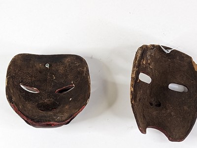 Lot 35 - Two Japanese carved wooden Noh masks, largest...