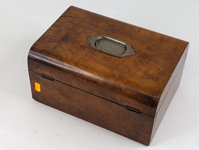 Lot 52 - *A Victorian walnut workbox, the lid...
