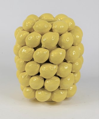 Lot 61 - A yellow glazed vase with high relief lemon...