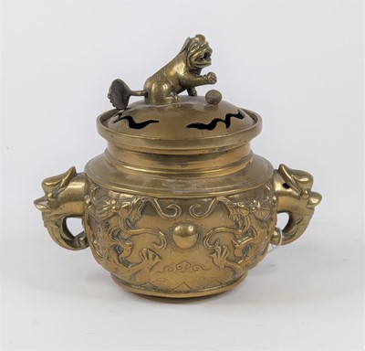 Lot 62 - A Chinese brass censer the pieced cover...