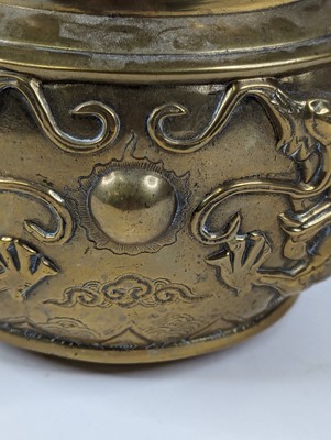 Lot 62 - A Chinese brass censer the pieced cover...