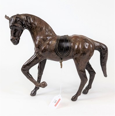 Lot 68 - *A leather clad model of a standing horse,...