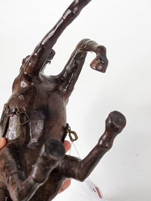 Lot 68 - *A leather clad model of a standing horse,...
