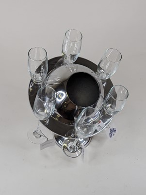 Lot 72 - A polished metal ice bucket in the form of...