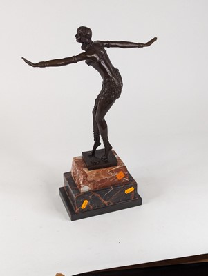 Lot 75 - An Art Deco style bronzed metal figure of a...