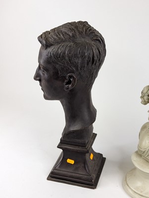 Lot 76 - *A painted composite bust of a young man, upon...
