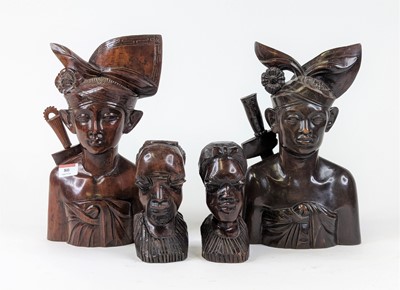 Lot 80 - *A pair of Indonesian carved hardwood head &...