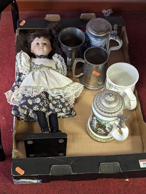 Lot 101 - A 20th century bisque headed doll on stand,...
