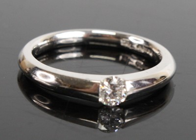 Lot 1233 - A platinum diamond solitaire ring, featuring a...