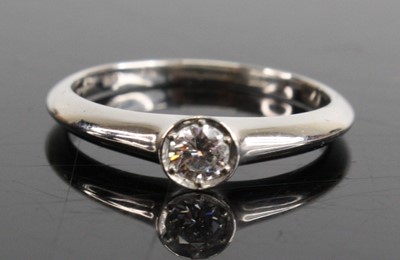 Lot 1235 - A platinum diamond solitaire ring, having a...