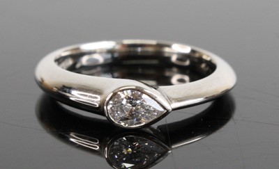 Lot 1236 - A platinum diamond solitaire ring, comprising...