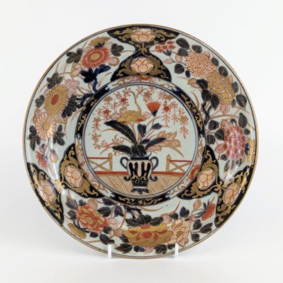 Lot 1435 - A Japanese Imari porcelain charger, 18th...