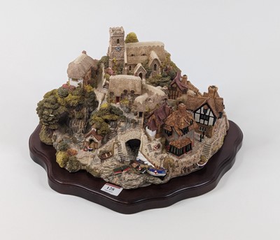 Lot 128 - A Lilliput Lane resin model of St Peter's Cove,...