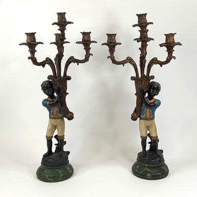 Lot 136 - *A pair of reproduction resin Blackamoor...