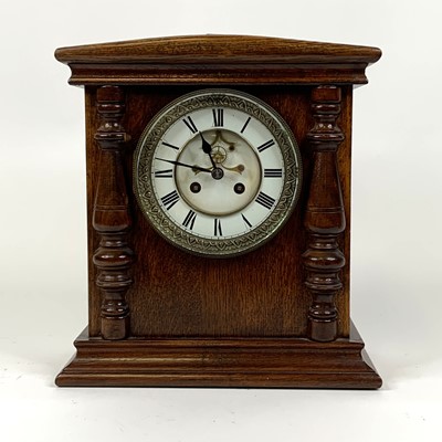 Lot 150 - An early 20th century oak cased mantel clock,...
