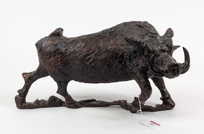 Lot 163 - A carved oak model of a boar, shown in...