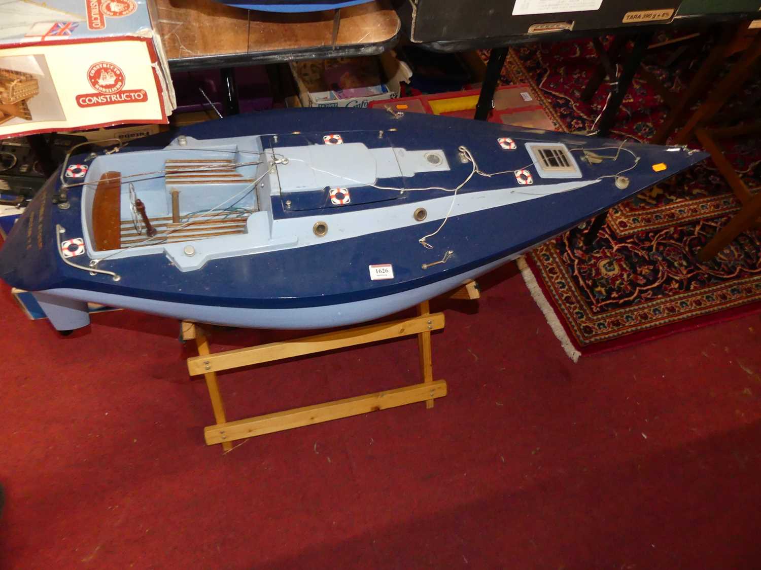 Lot 1626 - A plastic hull sailing boat called "The...