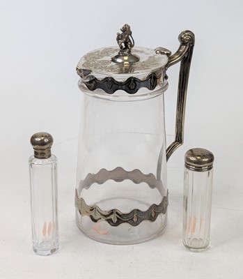 Lot 226 - An Edwardian glass claret jug, having silver...