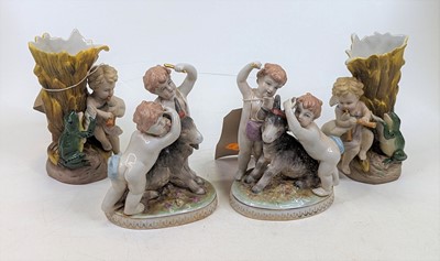 Lot 259 - A pair of continental porcelain figure groups...