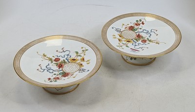 Lot 260 - A pair of Victorian porcelain pedestal cake...