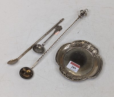 Lot 289 - *An Eastern white metal pin tray, repousse...