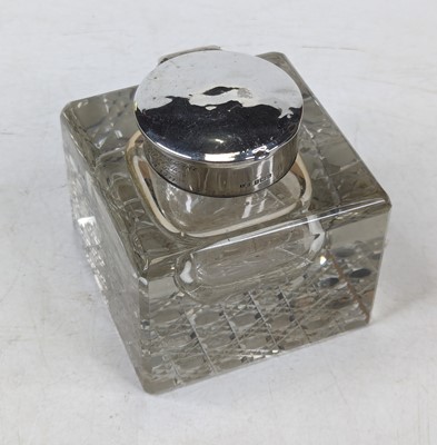 Lot 300 - An Edwardian silver mounted cut glass inkwell,...