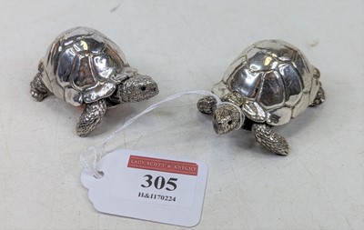 Lot 305 - A pair of Elizabeth II filled silver models of...