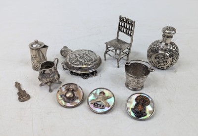 Lot 308 - A collection of white metal items, to include...