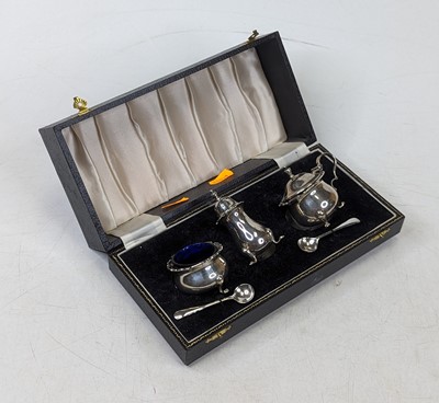 Lot 310 - A George V silver three-piece cruet,...