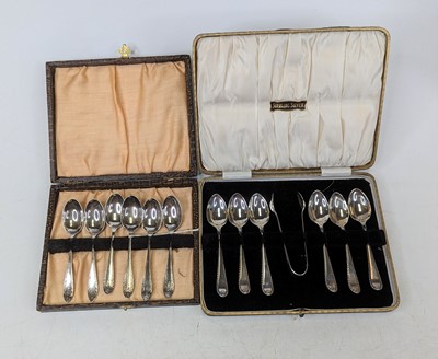 Lot 311 - A set of six George V silver teaspoons and...