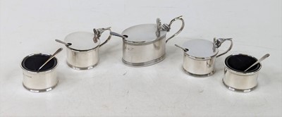 Lot 328 - A matched silver cruet set, comprising oval...