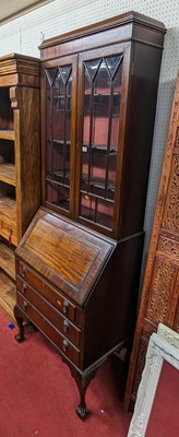 Lot 1170 - *An early 20th century mahogany bureau...