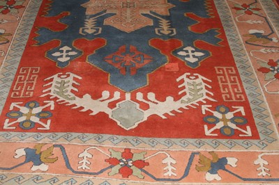 Lot 1198 - A Turkish woollen bright coloured rug, floral...
