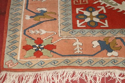 Lot 1198 - A Turkish woollen bright coloured rug, floral...