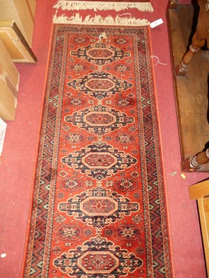 Lot 1199 - Two Persian style red ground woollen Bokhara...