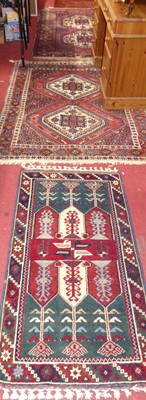 Lot 1204 - *Two similar Persian woollen blue, red and...