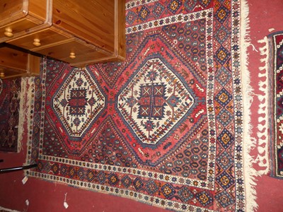 Lot 1204 - *Two similar Persian woollen blue, red and...