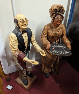 Lot 1219 - A painted resin standing model of a butler,...