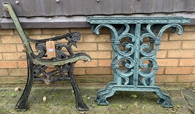 Lot 1194 - A pair of black painted pierced cast iron...