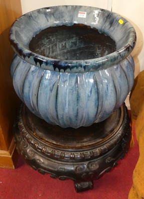 Lot 1224 - *A large stoneware turquoise drip-glazed...
