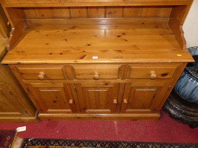 Lot 1225 - A contemporary pine kitchen dresser, w.129cm