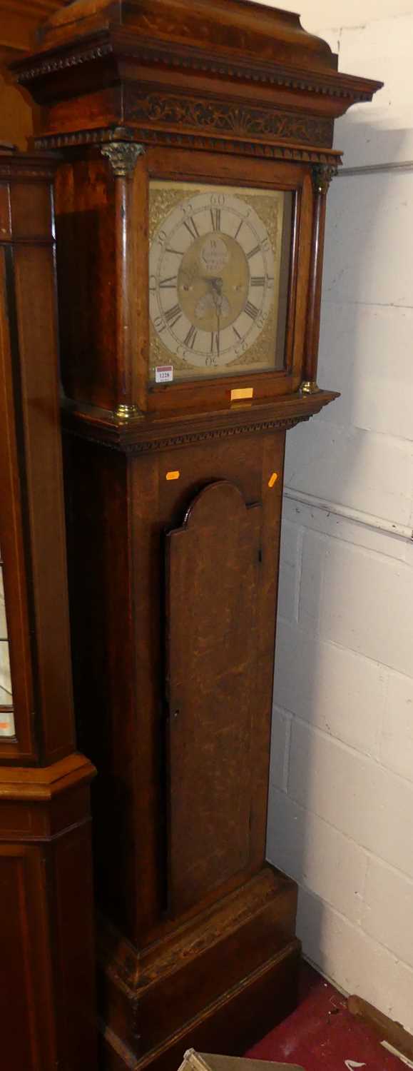 Lot 1228 - A circa 1800 provincial oak longcase clock,...