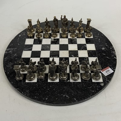 Lot 450 - A polished hardstone chess board, together...