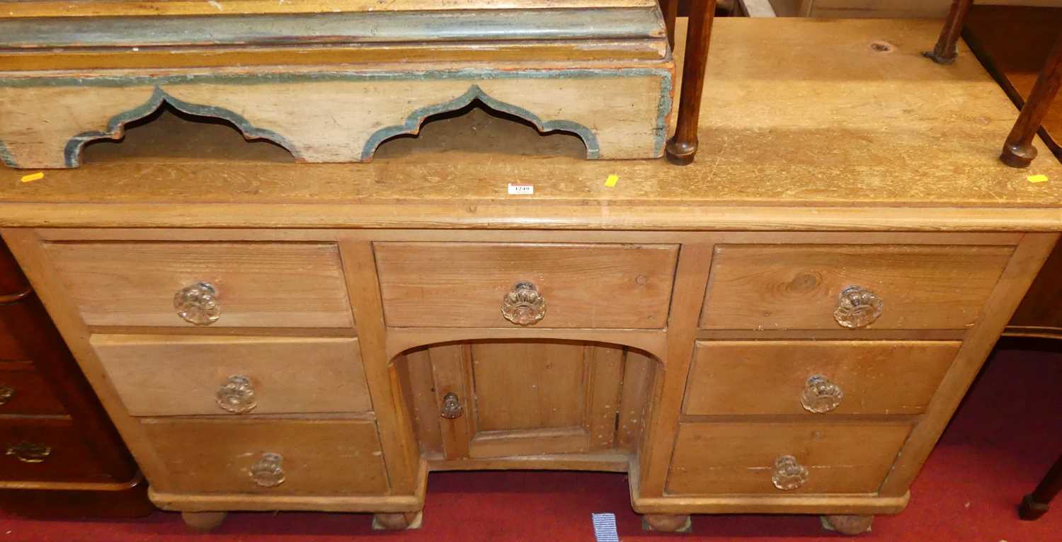 Lot 1249 - A mid-Victorian pine round cornered dresser...